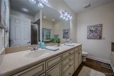 Enjoy maintenance-free living and tru main-level comfort- on The Club At Porto Cima in Missouri - for sale on GolfHomes.com, golf home, golf lot