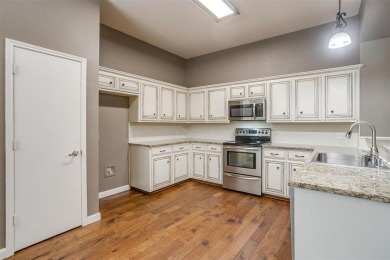 Welcome to this charming 3-bed, 2.5 bath home nestled on a on Mansfield National Golf Club in Texas - for sale on GolfHomes.com, golf home, golf lot