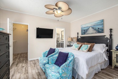 Welcome to this two-bedroom, two-bathroom home in the Waterway on Barefoot Resort and Golf Club  in South Carolina - for sale on GolfHomes.com, golf home, golf lot
