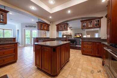Stunning Contemporary Brick and Stone Ranch style home with on  in Illinois - for sale on GolfHomes.com, golf home, golf lot