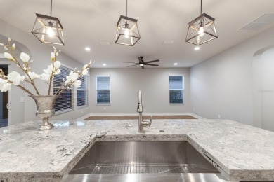 Under contract-accepting backup offers. CUSTOM WATERFRONT POOL on Esplanade Golf and Country at Lakewood Ranch in Florida - for sale on GolfHomes.com, golf home, golf lot