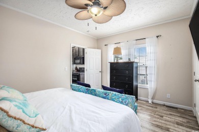 Welcome to this two-bedroom, two-bathroom home in the Waterway on Barefoot Resort and Golf Club  in South Carolina - for sale on GolfHomes.com, golf home, golf lot