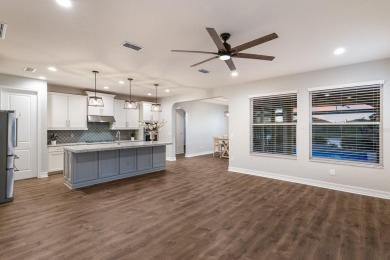Under contract-accepting backup offers. CUSTOM WATERFRONT POOL on Esplanade Golf and Country at Lakewood Ranch in Florida - for sale on GolfHomes.com, golf home, golf lot