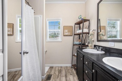 Welcome to this two-bedroom, two-bathroom home in the Waterway on Barefoot Resort and Golf Club  in South Carolina - for sale on GolfHomes.com, golf home, golf lot