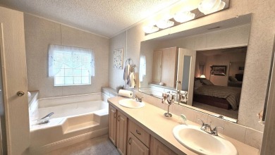 Welcome to your dream home in the exclusive Golf Course on Blue Heron Pines Golf Course in Florida - for sale on GolfHomes.com, golf home, golf lot