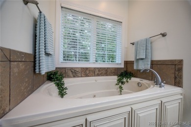 Enjoy maintenance-free living and tru main-level comfort- on The Club At Porto Cima in Missouri - for sale on GolfHomes.com, golf home, golf lot