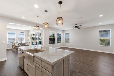 Under contract-accepting backup offers. CUSTOM WATERFRONT POOL on Esplanade Golf and Country at Lakewood Ranch in Florida - for sale on GolfHomes.com, golf home, golf lot