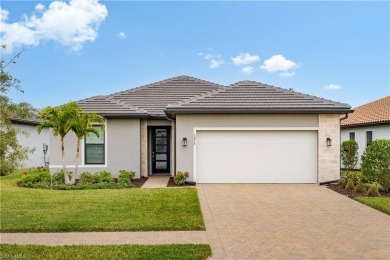 This elegant 3-bedroom, 3-bath home in the highly sought-after on Valencia Golf and Country Club in Florida - for sale on GolfHomes.com, golf home, golf lot