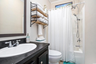 Welcome to this two-bedroom, two-bathroom home in the Waterway on Barefoot Resort and Golf Club  in South Carolina - for sale on GolfHomes.com, golf home, golf lot