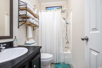 Welcome to this two-bedroom, two-bathroom home in the Waterway on Barefoot Resort and Golf Club  in South Carolina - for sale on GolfHomes.com, golf home, golf lot