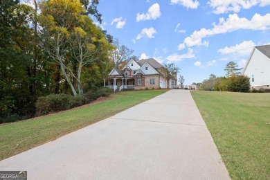 Welcome to your dream home in the highly sought-after Traditions on Traditions of Braselton Golf Club in Georgia - for sale on GolfHomes.com, golf home, golf lot