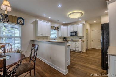 Enjoy maintenance-free living and tru main-level comfort- on The Club At Porto Cima in Missouri - for sale on GolfHomes.com, golf home, golf lot