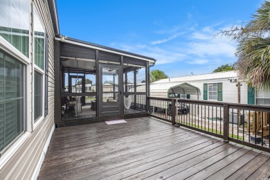 Welcome to this two-bedroom, two-bathroom home in the Waterway on Barefoot Resort and Golf Club  in South Carolina - for sale on GolfHomes.com, golf home, golf lot