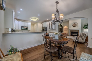 Enjoy maintenance-free living and tru main-level comfort- on The Club At Porto Cima in Missouri - for sale on GolfHomes.com, golf home, golf lot