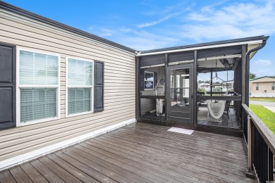 Welcome to this two-bedroom, two-bathroom home in the Waterway on Barefoot Resort and Golf Club  in South Carolina - for sale on GolfHomes.com, golf home, golf lot