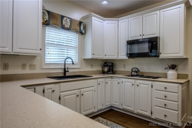 Enjoy maintenance-free living and tru main-level comfort- on The Club At Porto Cima in Missouri - for sale on GolfHomes.com, golf home, golf lot