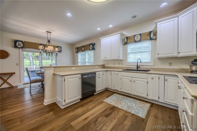 Enjoy maintenance-free living and tru main-level comfort- on The Club At Porto Cima in Missouri - for sale on GolfHomes.com, golf home, golf lot