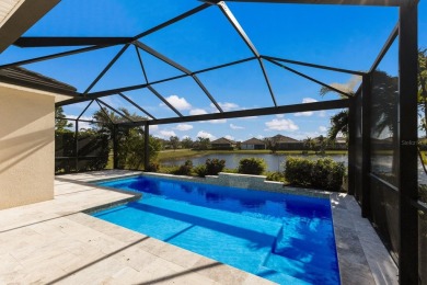 Under contract-accepting backup offers. CUSTOM WATERFRONT POOL on Esplanade Golf and Country at Lakewood Ranch in Florida - for sale on GolfHomes.com, golf home, golf lot