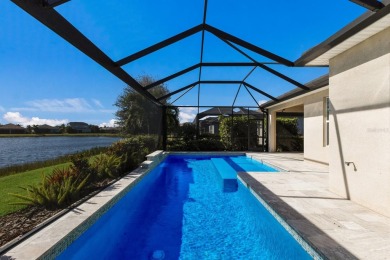 Under contract-accepting backup offers. CUSTOM WATERFRONT POOL on Esplanade Golf and Country at Lakewood Ranch in Florida - for sale on GolfHomes.com, golf home, golf lot