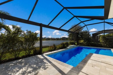 Under contract-accepting backup offers. CUSTOM WATERFRONT POOL on Esplanade Golf and Country at Lakewood Ranch in Florida - for sale on GolfHomes.com, golf home, golf lot