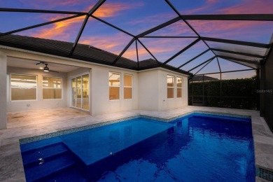Under contract-accepting backup offers. CUSTOM WATERFRONT POOL on Esplanade Golf and Country at Lakewood Ranch in Florida - for sale on GolfHomes.com, golf home, golf lot
