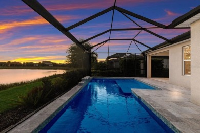 Under contract-accepting backup offers. CUSTOM WATERFRONT POOL on Esplanade Golf and Country at Lakewood Ranch in Florida - for sale on GolfHomes.com, golf home, golf lot