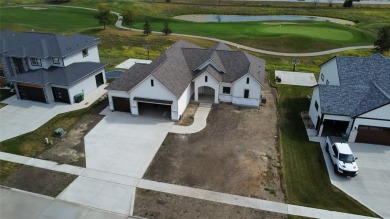 Discover the epitome of tranquil living in this charming
 on Otter Creek Golf Course in Iowa - for sale on GolfHomes.com, golf home, golf lot