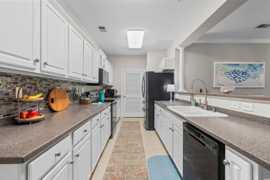 As you walk into this first floor 2 bedroom / 2 bath unit in on Barefoot Resort and Golf Club  in South Carolina - for sale on GolfHomes.com, golf home, golf lot