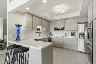 This 3-bed, 3-bath 3rd-floor condo at Desert Island combines on Desert Island Golf and Country Club in California - for sale on GolfHomes.com, golf home, golf lot