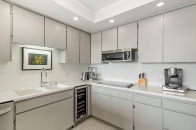 This 3-bed, 3-bath 3rd-floor condo at Desert Island combines on Desert Island Golf and Country Club in California - for sale on GolfHomes.com, golf home, golf lot