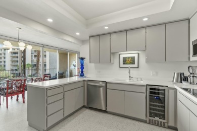This 3-bed, 3-bath 3rd-floor condo at Desert Island combines on Desert Island Golf and Country Club in California - for sale on GolfHomes.com, golf home, golf lot