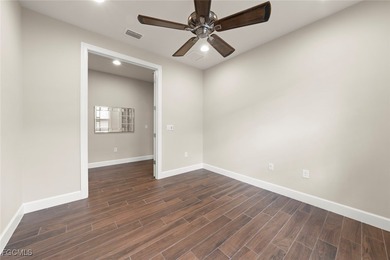 This Immaculate Summerwood home invites comfort, luxury, and on The Plantation Golf and Country Club in Florida - for sale on GolfHomes.com, golf home, golf lot