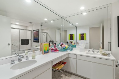 This 3-bed, 3-bath 3rd-floor condo at Desert Island combines on Desert Island Golf and Country Club in California - for sale on GolfHomes.com, golf home, golf lot