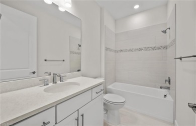 The Highgate is a well-appointed 4-bedroom, 2-bathroom home with on River Hall Country Club in Florida - for sale on GolfHomes.com, golf home, golf lot