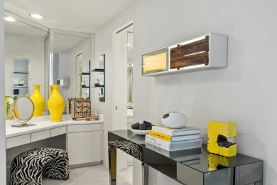 This 3-bed, 3-bath 3rd-floor condo at Desert Island combines on Desert Island Golf and Country Club in California - for sale on GolfHomes.com, golf home, golf lot