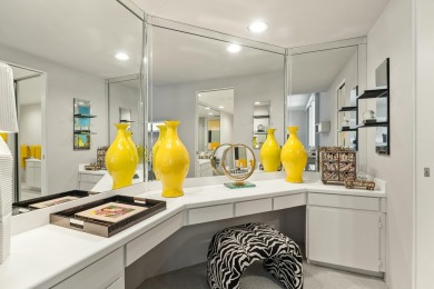 This 3-bed, 3-bath 3rd-floor condo at Desert Island combines on Desert Island Golf and Country Club in California - for sale on GolfHomes.com, golf home, golf lot