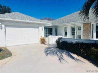 Charming Florida Designed Sun Terrace-Courtyard Entry Home on Royal Oaks Golf Club in Florida - for sale on GolfHomes.com, golf home, golf lot