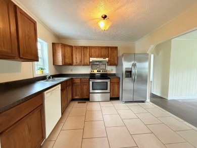 Discover this delightful two-bedroom, 1.5-bath residence nestled on Arlington Association in Kentucky - for sale on GolfHomes.com, golf home, golf lot