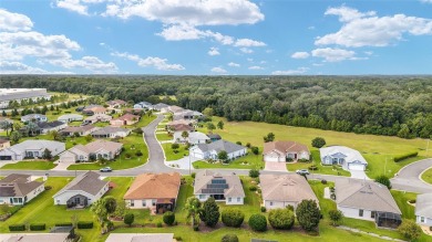 Beautifully maintained and loved Magnolia home - 3 Bedroom/2 on Stonecrest Golf and Club Club in Florida - for sale on GolfHomes.com, golf home, golf lot