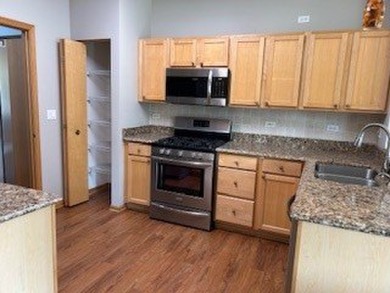 Welcome to this beautifully UPDATED 1267 sq. ft., 2-bedroom, 1 on The Links at Carillon in Illinois - for sale on GolfHomes.com, golf home, golf lot