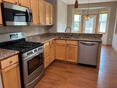 Welcome to this beautifully UPDATED 1267 sq. ft., 2-bedroom, 1 on The Links at Carillon in Illinois - for sale on GolfHomes.com, golf home, golf lot