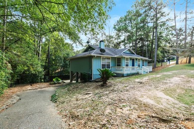 Discover this charming Daphne home in Lake Forest Subdivision! on Lake Forest Yacht and Country Club in Alabama - for sale on GolfHomes.com, golf home, golf lot