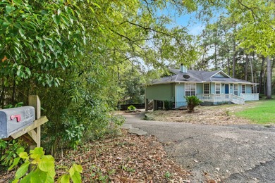 Discover this charming Daphne home in Lake Forest Subdivision! on Lake Forest Yacht and Country Club in Alabama - for sale on GolfHomes.com, golf home, golf lot