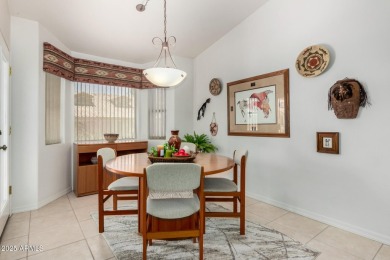 Enjoy the charm of this delightful 2-bedroom end-unit townhome! on Apache Wells Country Club in Arizona - for sale on GolfHomes.com, golf home, golf lot