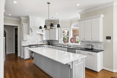 Welcome to your new sanctuary of luxury, situated within the on Hollytree Country Club in Texas - for sale on GolfHomes.com, golf home, golf lot