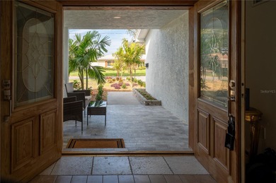 This beautifully remodeled home is in one of St Petersburg's on Pasadena Yacht and Country Club in Florida - for sale on GolfHomes.com, golf home, golf lot