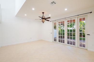 Beautifully maintained 4-bedroom, 2.5-bath home with a 2-car on The Links At Madison Green in Florida - for sale on GolfHomes.com, golf home, golf lot