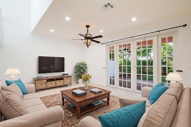 Beautifully maintained 4-bedroom, 2.5-bath home with a 2-car on The Links At Madison Green in Florida - for sale on GolfHomes.com, golf home, golf lot