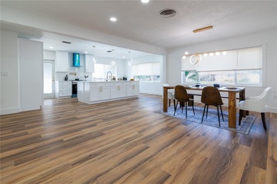 This beautifully remodeled home is in one of St Petersburg's on Pasadena Yacht and Country Club in Florida - for sale on GolfHomes.com, golf home, golf lot
