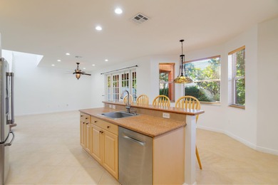 Beautifully maintained 4-bedroom, 2.5-bath home with a 2-car on The Links At Madison Green in Florida - for sale on GolfHomes.com, golf home, golf lot